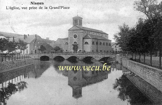 ancienne carte postale de Nismes L'église, vue prise de la Grand'Place