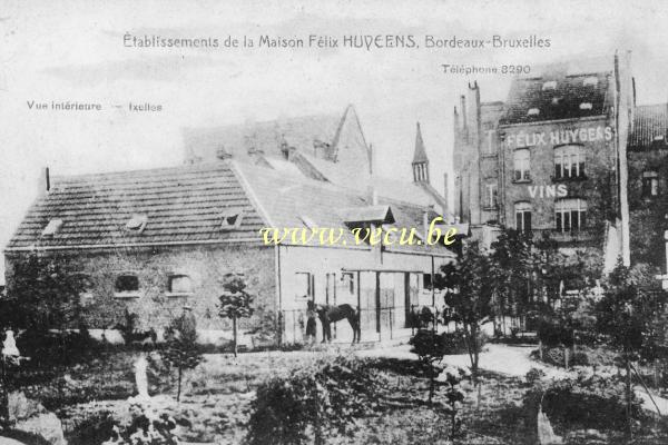 ancienne carte postale de Ixelles Etablissements de la Maison Félix Huygens, vins (14 rue E. Cattoir)