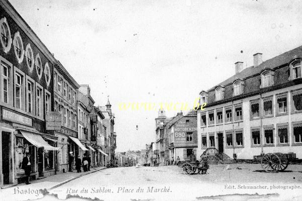 ancienne carte postale de Bastogne Rue du Sablon. Place du Marché