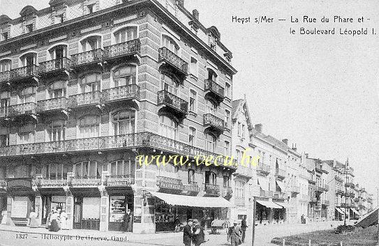 ancienne carte postale de Heyst La rue du Phare et le boulevard Léopold I