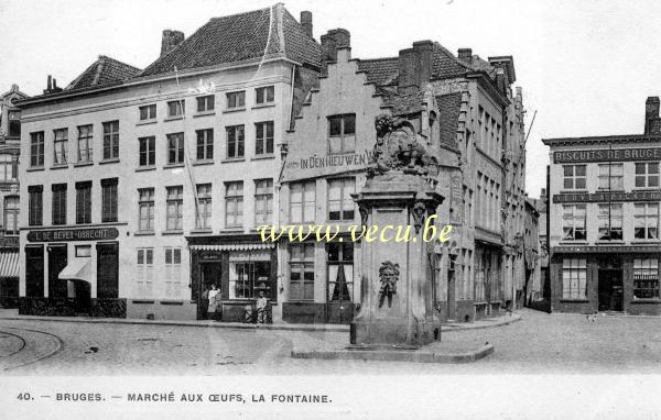 ancienne carte postale de Bruges Marché aux oeufs, la Fontaine