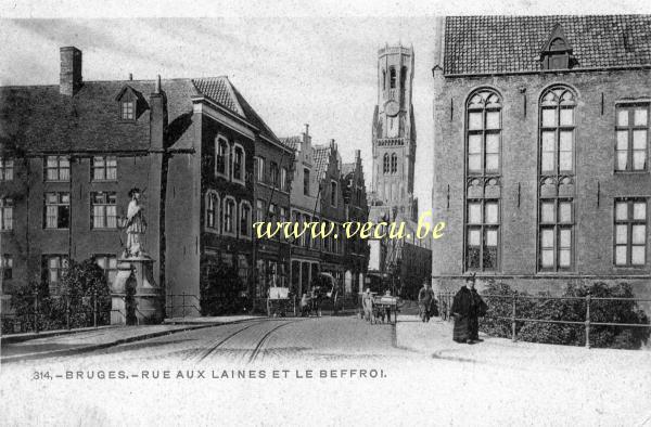ancienne carte postale de Bruges Rue aux Laines et le Beffroi