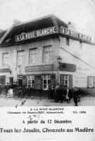 carte postale ancienne de Schaerbeek A la rose blanche - Estaminet Chaussée d'Haecht 357