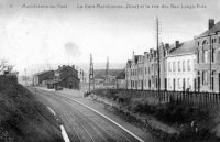carte postale ancienne de Marchienne-au-pont La Gare marchande (zône) et la rue des bas-longs-prés.