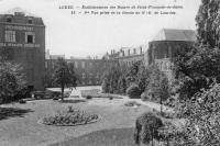 carte postale ancienne de Leuze-en-Hainaut Etablissement des Dames de Saint-François-de-Sales.  Vue prise de la grotte N-D de Lourdes