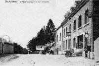 carte postale ancienne de Neufchâteau L'Hôtel Terminus et la route d'Ostende